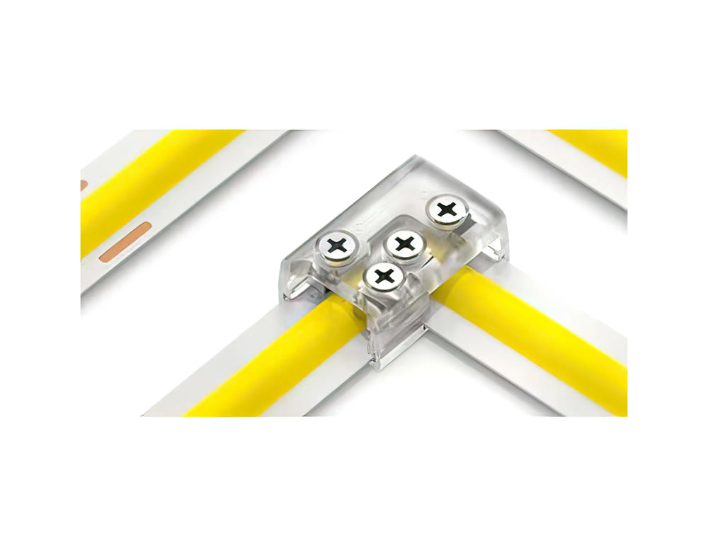 A close-up of an EnoLED Series 2-Pin Solderless White LED Strip Screw Connector (10mm) joining two yellow LED strip lights at a right angle, with visible screws securing the connection.