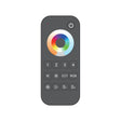 The EnoLED EnoSync Series RGB+TW Touch Wheel RF Remote, shown in black with labeled buttons and a power switch, intuitively controls LED lighting modes like RGB, CCT, brightness, and scenes against a white background.