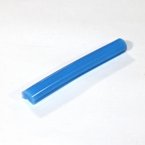 A single Marsella Flexible Color Diffuser for LED Strip, blue in color, is shown on a white surface with one end closer to the camera, highlighting its flexible design for architectural lighting applications.