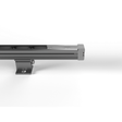 A close-up of the Linear LED Wall Washer Light ~ Fortis 3 Series with mounting bracket, set against a white background. Only part of its metallic housing and end cap are visible, highlighting its architectural design.