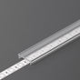 The LED Channel Cover ~ F Click, a transparent rectangular channel, securely houses a white LED strip on a gray surface, demonstrating its ability to neatly protect and organize lighting installations.