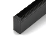 Close-up of a black Hannover Profile with a textured top edge, featuring a precisely fitted Plastic End Cap for Hannover Profile—possibly part of hardware or a structural component.