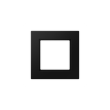The Thermoplastic 1‑Gang Surface Mount Cap ~ Model A 5581 BF A is a black frame with a recessed center, made from quality thermoplastic. Its minimal, modern look suits contemporary interiors and contrasts well against white surfaces.