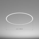 A glowing circular KOZMA-BD LED lighting fixture is mounted on the plain gray ceiling, with a label below showing a minimum diameter of 1000 mm.