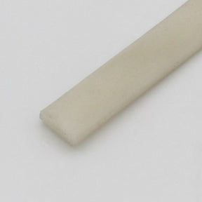 A close-up of the rectangular, flat, off-white Upper cover for Niza Duo is shown on a plain light background.