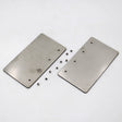 Two Aluminum Straight Joints for Munich Magnum with holes are side by side on a white surface. Several small metal balls are scattered around them, resembling parts from the assembly set.
