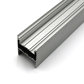 A close-up of the Direct/Indirect Linear Pendant Lighting LED Channel ~ Model DPL70FL, a silver aluminum extrusion with multiple grooves and channels, ideal for structural framing, industrial use, or housing high-power LED strips.