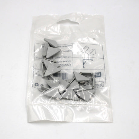 A sealed clear plastic bag containing several gray End Caps for Cabi12 Profile and an instruction sheet is shown on a plain white background.