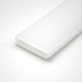 A close-up of the LED Channel Cover for KOZUS-BD Profile shows its white, rectangular plastic design with beveled edges, photographed against a plain white background—ideal for modern lighting solutions.