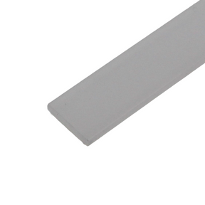 A gray, rectangular LED Diffuser for Treadable Easy-On Profiles with smooth edges and IK10 impact resistance extends diagonally across a white background, demonstrating its walk-over safe design. Only part of the diffuser is visible.