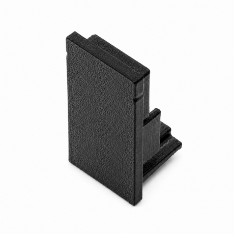 The Plastic End Cap for Hannover Profile is a black, rectangular, 3D printed piece with a textured surface and stepped edges, made in the USA and shown upright on a white background.