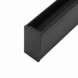 Close-up of a black Plastic End Cap for Hannover Profile, 3D printed with a textured finish. The rectangular cap is partially open, revealing its dark interior, and is set against a white background.