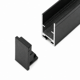 A black Hannover Profile metal channel with a hollow, grooved cross-section is shown on a white background alongside the Plastic End Cap for Hannover Profile in matching black plastic.