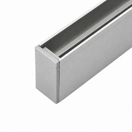 A close-up view of a rectangular metal channel with a hollow interior, featuring a Plastic End Cap for Hannover Profile, shown against a plain white background.