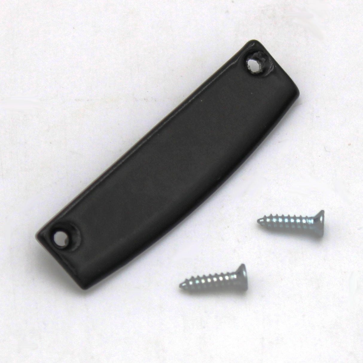 An Aluminum End Cap for SLW10 Profile, rectangular and black, crafted from metal in Europe and featuring two holes at each end, is displayed on a white background beside two silver screws.