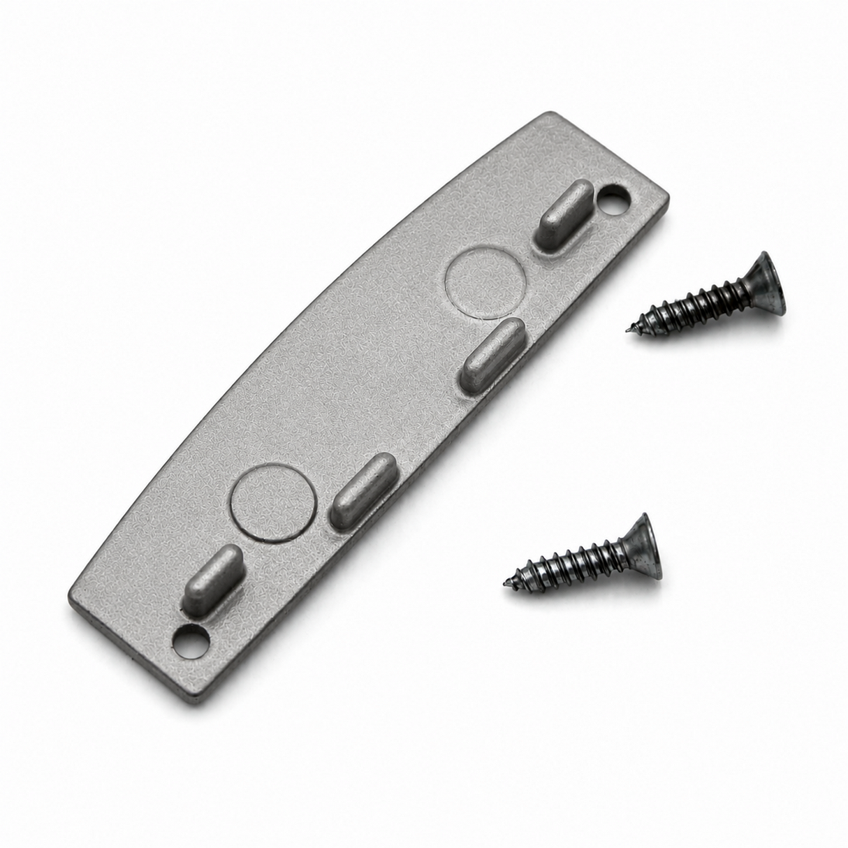 Here is a revised version using the provided product data: A flat, gray Aluminum End Cap for SLW10 Profile features three raised oval bumps, two circular indents, and two screw holes at each end. This European-made accessory comes with two black screws placed beside the end cap on a white background.