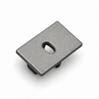 Rectangular grey aluminum end cap for Aluminum end cap for Alu Swiss LED profile, featuring a central oval cutout.
