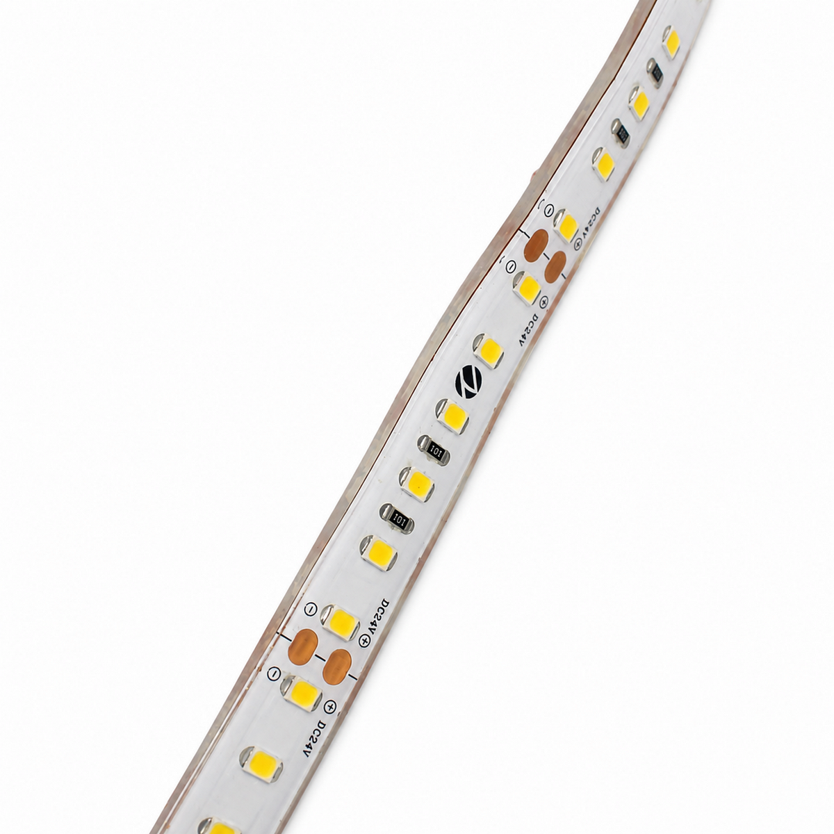 A close-up of the White High Output IP68 Waterproof LED Strip (24V) ~ King Protea Series, showcasing its flexible design with visible yellow LED chips and electronic components on a white background.
