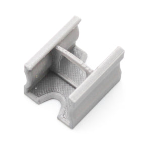 A compact, gray, 3D-printed PETG Linear Connector for SL15 Profile, featuring a U-shaped opening with two parallel walls and a central bar—perfect for joining Slimline 15mm LED profiles. Displayed on a white background.