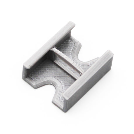 A compact, gray Linear Connector for SL7 Profile with a flat base, two parallel raised edges, and a central support bar, 3D printed and shown on a white background.