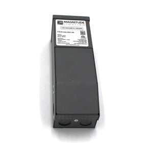 A black rectangular Magnitude M Series Dimmable Magnetic Core LED Driver (24V) with a white label showing specs and certifications, rounded edges, two circular bottom cutouts, and reliable power supply.