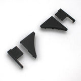 Four End Caps for Pula P10 Profile, made of black plastic in different shapes, are arranged in a row on a white background.