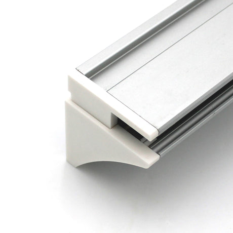 Close-up of the End Cap for Pula P10 Profile attached to a silver aluminum extrusion, featuring a white PETG corner connector, displayed against a plain white background.