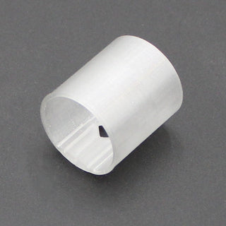 A translucent straight joiner for the Neon Redondo XL Profile, featuring a semi-transparent cylindrical white sleeve with a small rectangular side cutout, is displayed on a plain dark background.