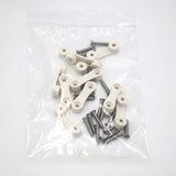 Clear plastic bag containing several LED Strip Saddle white plastic connecting pieces, silver screws, and surface mount accessories on a white background.