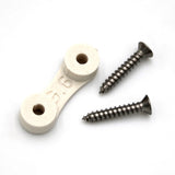 The LED Strip Saddle, a small white plastic bracket for waterproof LED strips, is shown next to two silver screws on a white background.