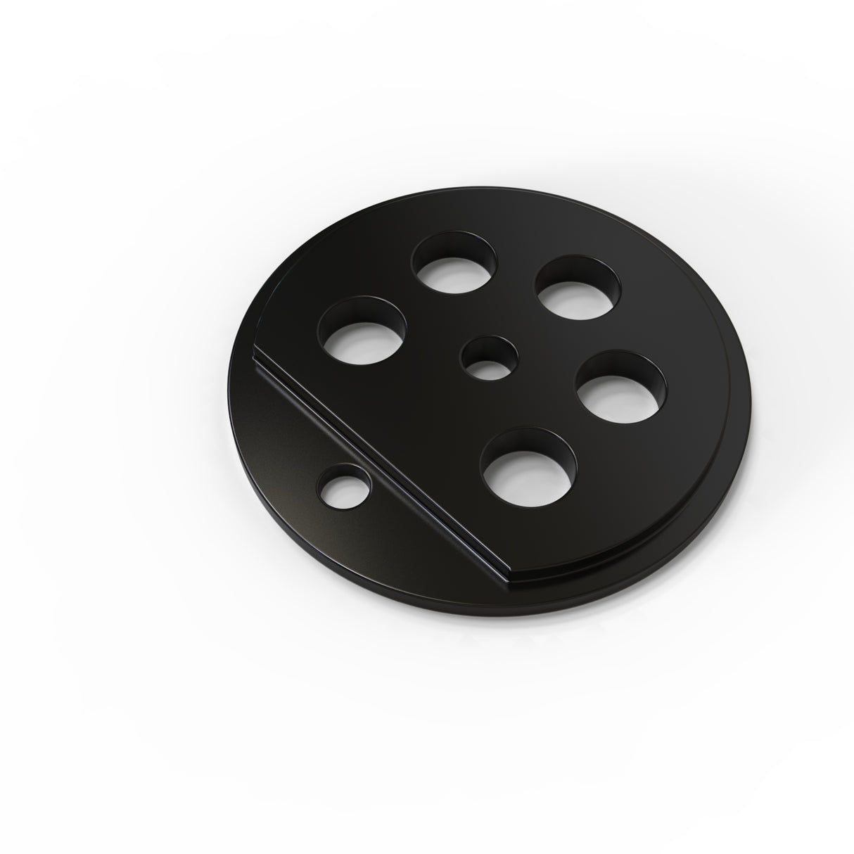 A round, flat, black Aluminum End Cap for Sierra38 Profile with six circular holes of varying sizes and a raised diagonal ridge sits on a white background.