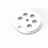 The Aluminum End Cap for Sierra38 Profile is white, features six round holes in a pattern, and has a diagonal groove with a small hole on one side—ideal for suspended lighting fixtures.