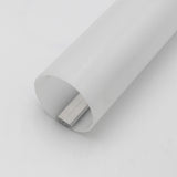 A close-up of the Sierra65 2.56 Round Acrylic LED Lighting Tube shows a white cylindrical diffuser with a rectangular metal bar partially inserted, resting on a plain white surface.