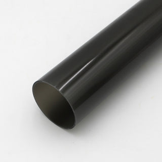 A close-up shows the 2.75 Round Polycarbonate LED Lighting Tube (Model Smokies70) in black, placed diagonally on a white surface with its open end facing the camera, ideal as an LED diffuser.