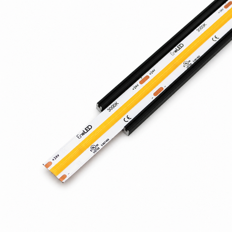 A close-up of the COB IP20 Dotless LED Strip (24V) ~ UniBasic Series, featuring a yellow lighting strip with black edges and labeled 24V and 3500K, set against a white background.