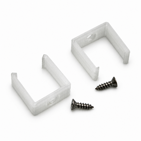Two white plastic Mounting Clips for Visby Profile, designed for Square LED Diffuser Tubes, are displayed with two metal screws on a white surface.