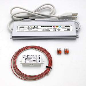 The Bluetooth Mesh LED Controller and Plug-in Driver Kit (24V) ~ Casambi CBU-PWM4 + EnoLED ELD, featuring a plug-in 24V LED driver, white control module, and orange wire connectors, is displayed on a white background.