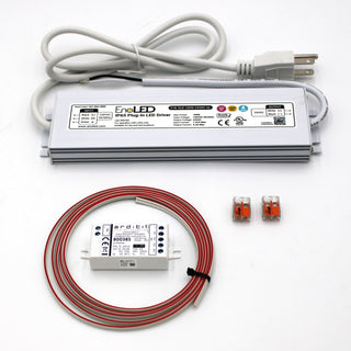 The Bluetooth Mesh LED Controller and Plug-in Driver Kit (24V) ~ Casambi CBU-PWM4 + EnoLED ELD, featuring a plug-in 24V LED driver, white control module, and orange wire connectors, is displayed on a white background.