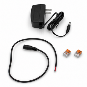 Plug-in Power Kit for Controllers and Sensors (12V) featuring a 12V plug-in power supply with a barrel plug, a DC female jack wire with exposed ends, and two lever-nut wire connectors.