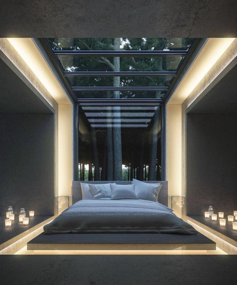 LED strips integrated into a room ceiling for soft indirect lighting.