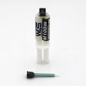 The Marine 2-part Methacrylate Adhesive ~ W4S M100 (25ml 1:1 Mix / B-System) features a blue and white dual-barrel cartridge standing upright, with a green mixing nozzle attachment and black cap placed in front.