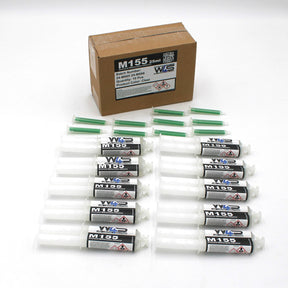 A brown box labeled Clear 2-part Methacrylate Adhesive ~ W4S M155 (25ml 1:1 Mix / A-System) is behind 12 M155-labeled syringes with clear adhesive and 12 green applicator tips, arranged in two rows on a white surface.