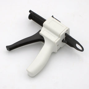 The Manual Cartridge Gun for Methacrylate 50ml 10:1 Mix (Round Flange) is a white and black trigger-handle applicator for adhesive dispensing, shown on a plain white background.
