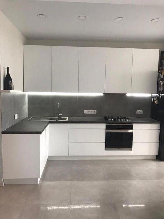 Minimalist Grey and White Kitchen with LED Strips Under Cabinet Lighting