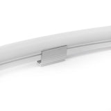 A close-up of a Neon-Style Flexible LED Light Line Max Series strip, curved and white or frosted, secured with a small rectangular aluminum Mounts For Neon-Style Flexible LED Light Line Max Series clip against a white background.