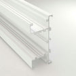 A close-up of the Up & Down Wall Feature Lighting LED Profile ~ Model New Washington, a white extruded aluminum profile with multiple grooves and channels, ideal for architectural accents or LED strip integration, shown isolated on a light background.
