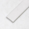 A close-up of the LED Diffuser for Standard Easy-On Profiles, a flat rectangular strip with rounded edges and a polycarbonate finish, shown on a light-colored surface.