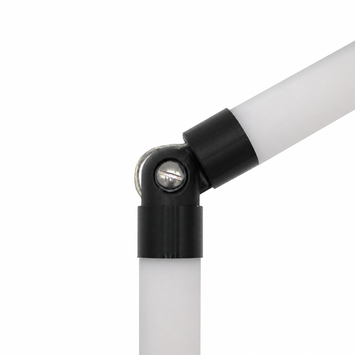 Close-up of a white diffuser tube system connected to another tube at an angle with a black and silver Hinge for Oslo Mini Profile, against a plain white background.