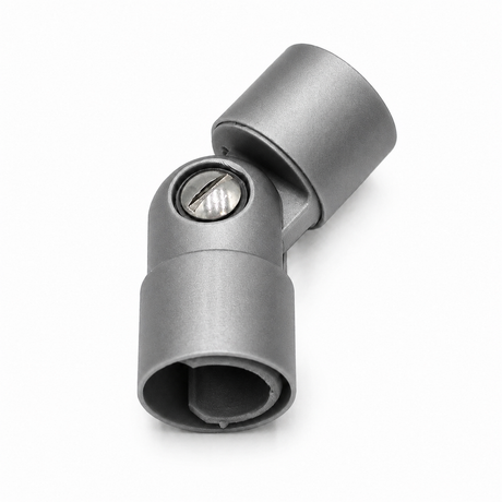 A close-up of a gray metal Hinge for Oslo Mini Profile with a visible screw and hexagonal openings on both ends, set against a white background—ideal as an adjustable lighting connector compatible with diverse setups.