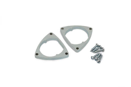 Two zinc-coated steel Simple Holders for Oval20 Profile, shaped as triangular brackets with rounded cutouts, are shown next to a small pile of silver screws on a white background.